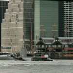 The U.S.S. Growler goes under the Brooklyn Bridge, passes by South Street Seaport.